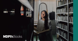 A woman browsing books in a physical library.