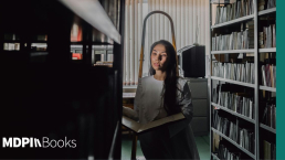 A woman browsing books in a physical library.
