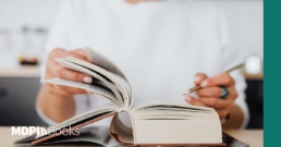 A man checking things in a book.